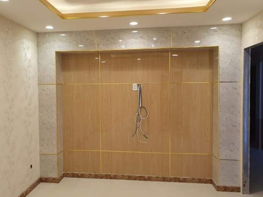 Tấm PVC vân đá ốp phòng khách (màu vàng nâu)