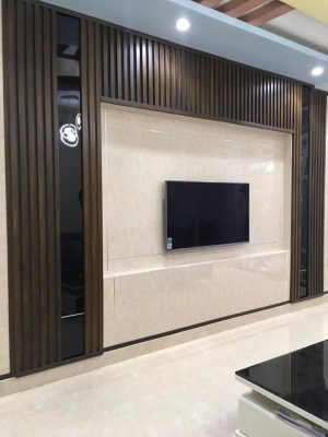 Tấm PVC vân đá + Lam nhựa giả gỗ ốp phòng khách
